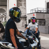 Two riders using helmet Bluetooth communication devices