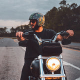Motorcycle rider wearing Daytona Helmets Cruiser motorcycle helmet with money design