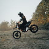 Motorcycle rider doing front wheelie while wearing Gloss Black Glide model modular helmet