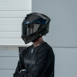 Rider wearing grey carbon fiber Viper model full face motorcycle helmet