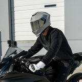 Rider wearing full face Viper model motorcycle helmet in cool grey