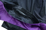 Women's purple and black reflective motorcycle rainsuit inside pocket detail